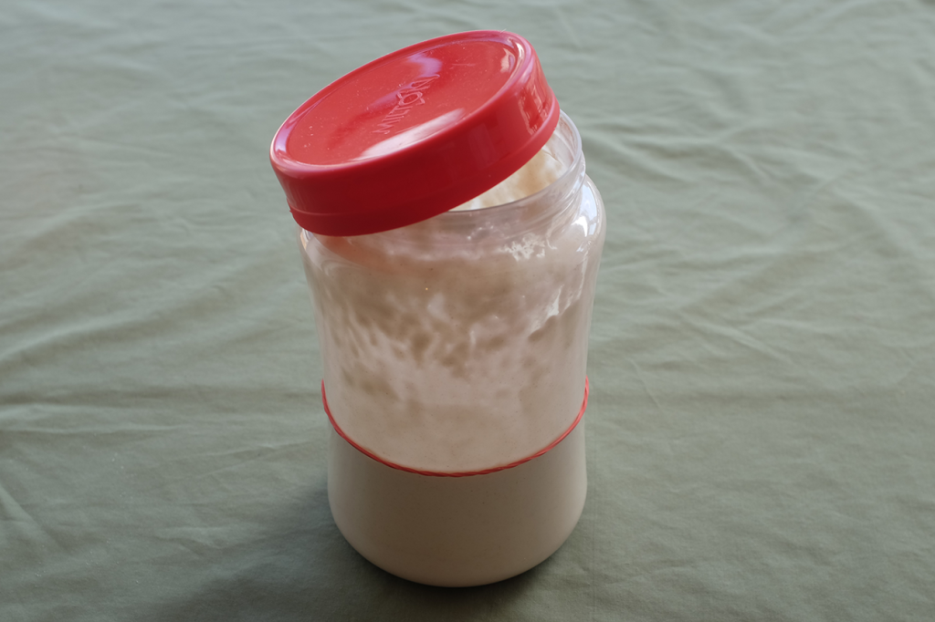 An image of my own sourdough starter in its jar.