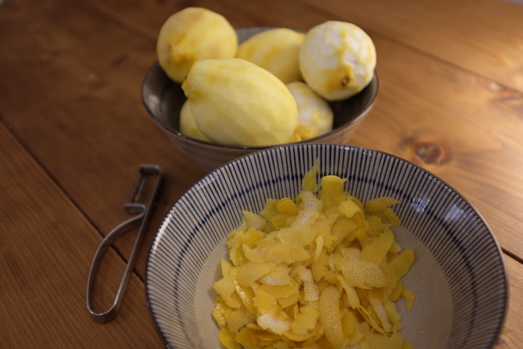 Lemons after having been peeled and zested.