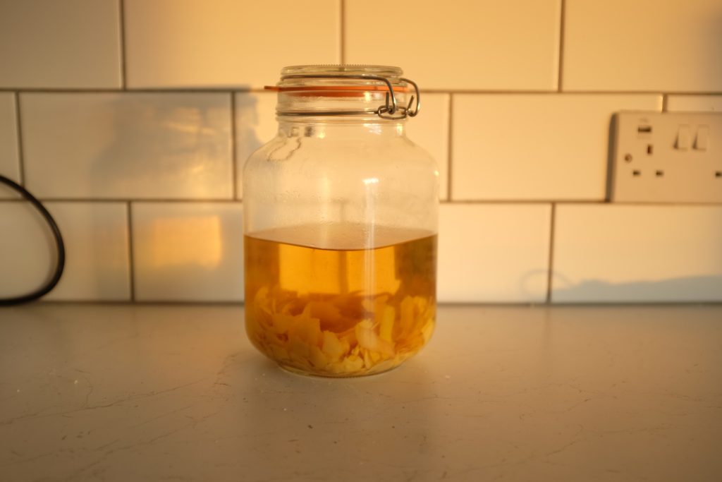 Limoncello macerating in a Kilner jar.